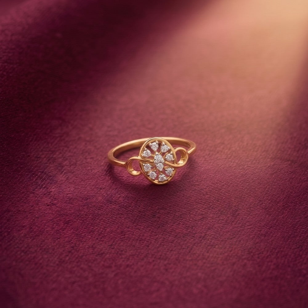 Gold and diamond with cluster setting on a red surafce.