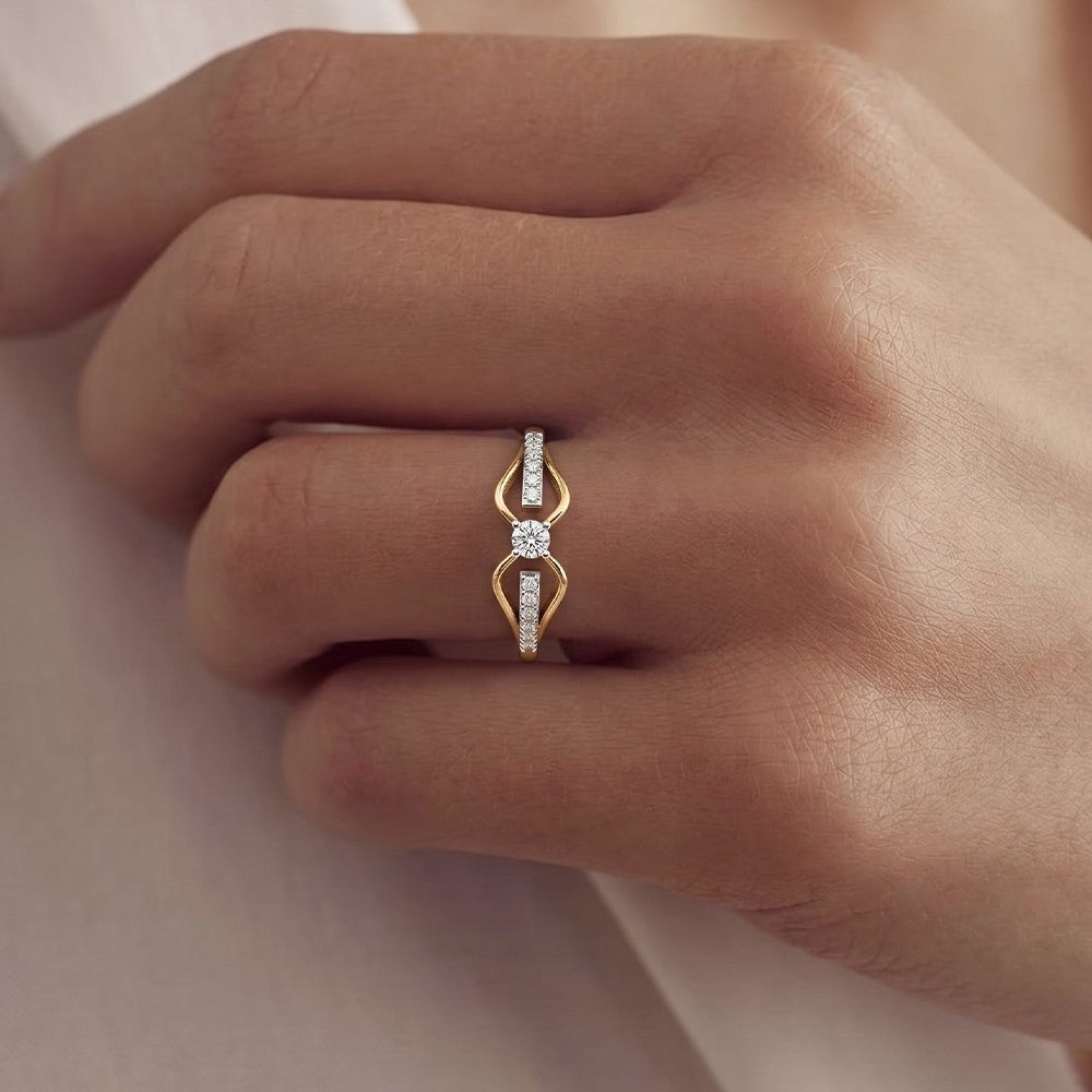 Close-up shot of gold and diamond women's ring.
