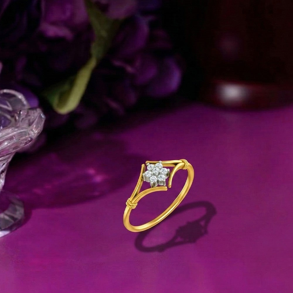 Gold and diamond with floral design on a purple surface.