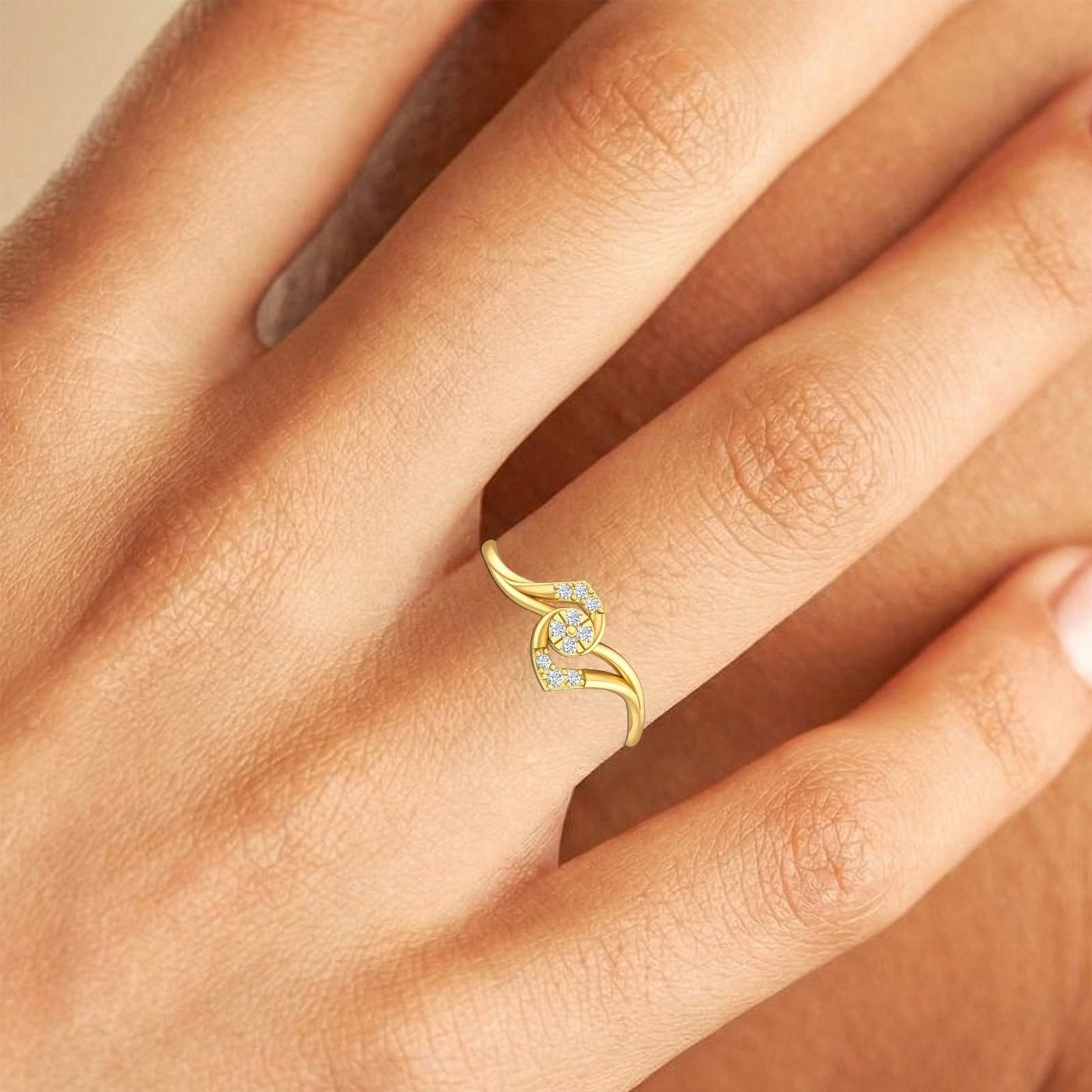 Close-up shot of a gold and diamond with cluster setting ring.
