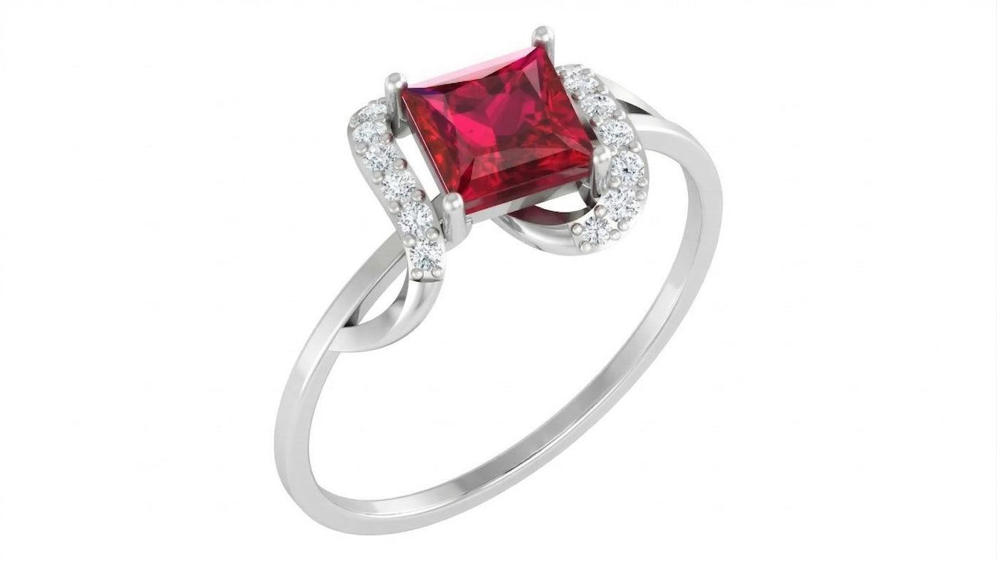 White gold and diamond with ruby gemstone on a white background.