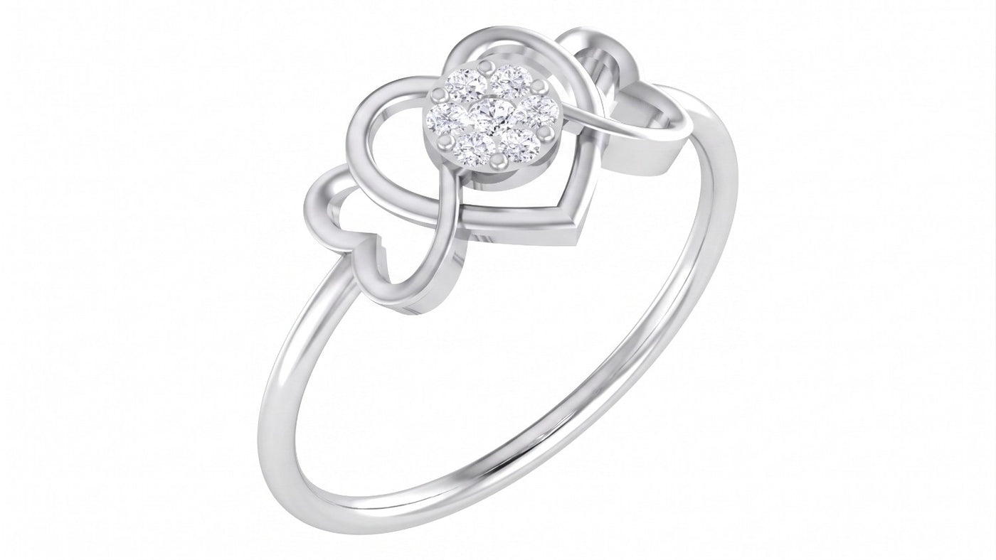 A white gold ring featuring a heart-shaped design with a central round cluster, shown on a plain white background.