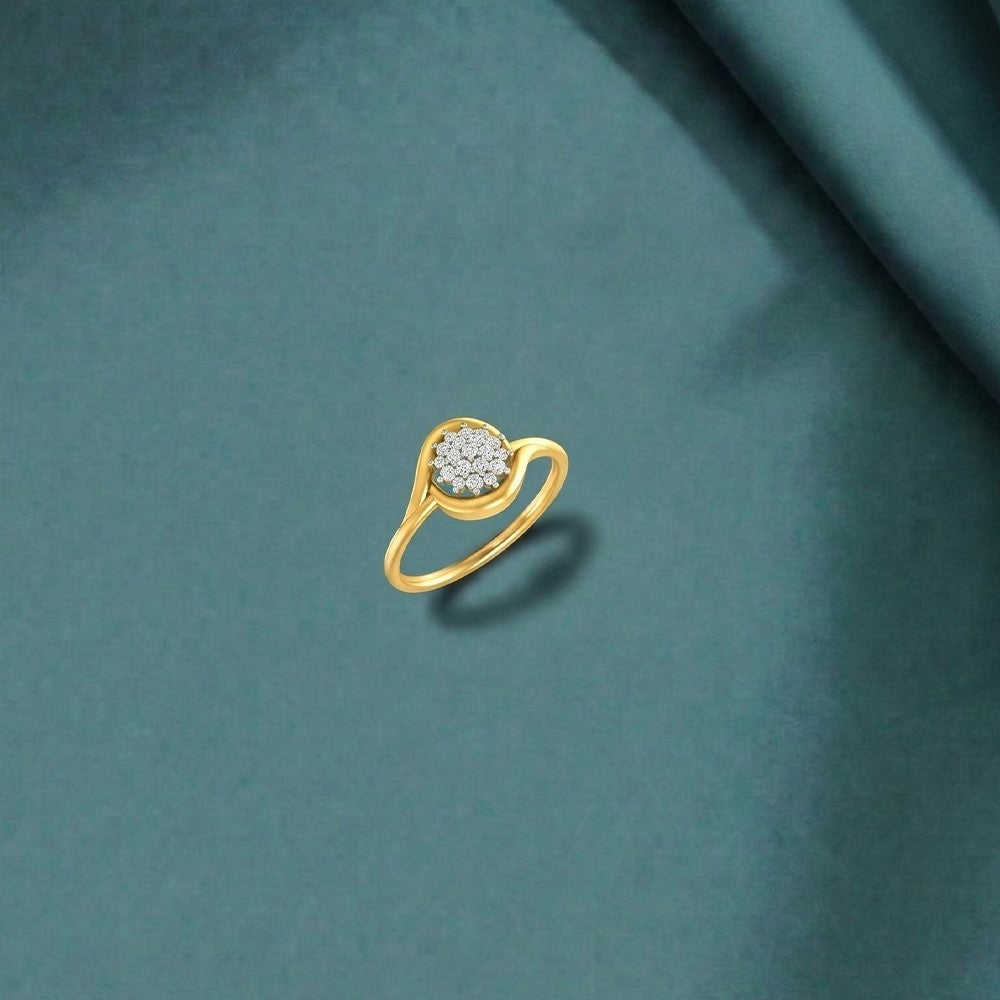 Gold and diamond with floral cluster on a teal surface.