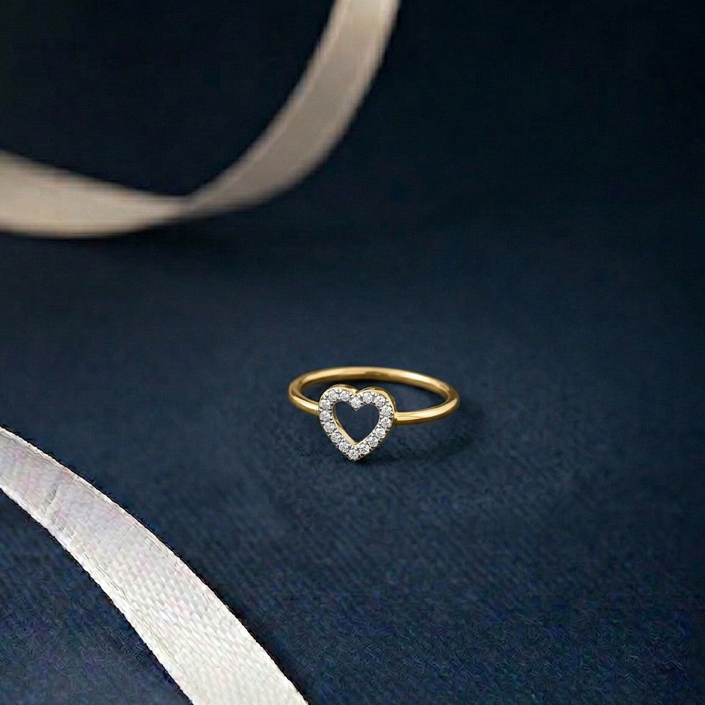 gold and diamond with heart-shaped on a blue surface.