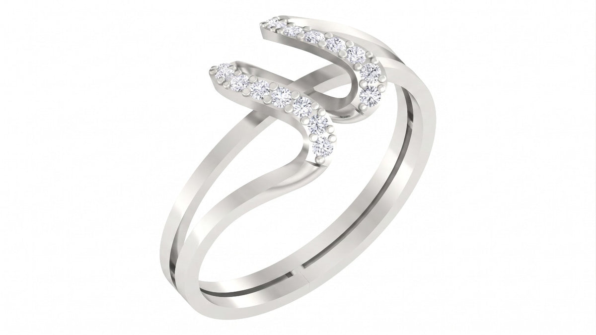 White gold ring with diamond accents on a white background
