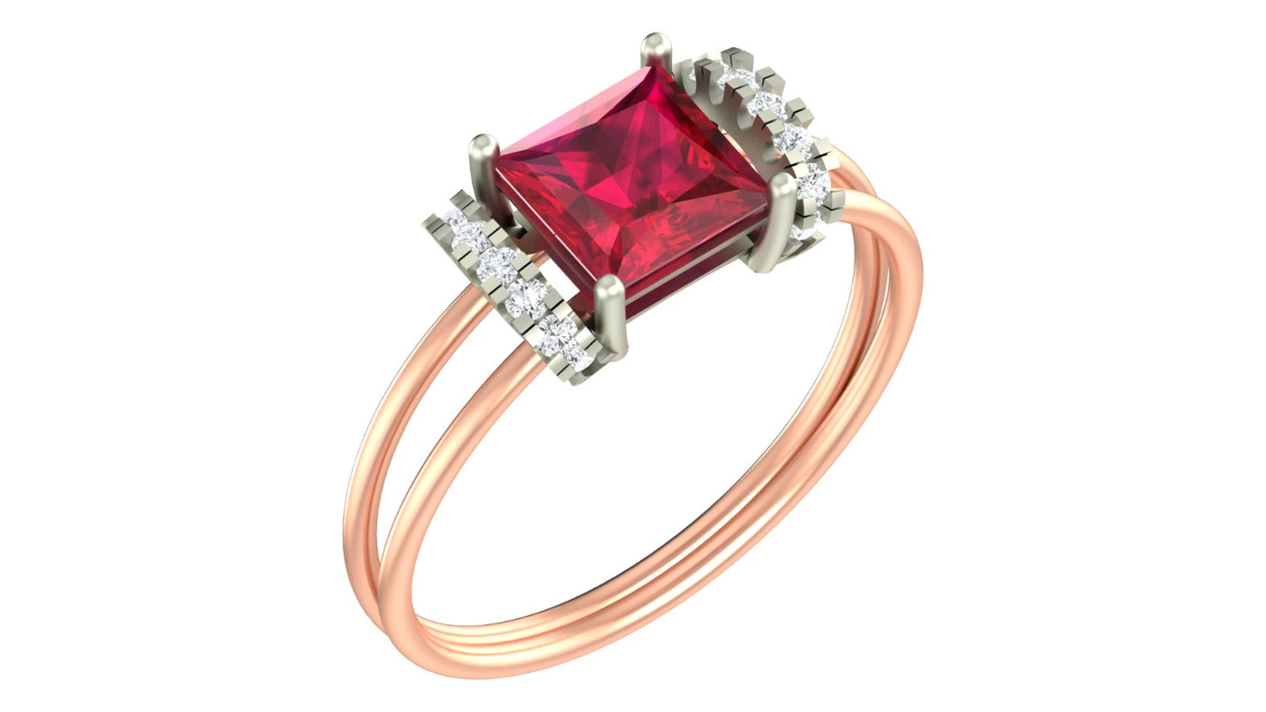 Rose gold and diamond with ruby gemstone on a white background.