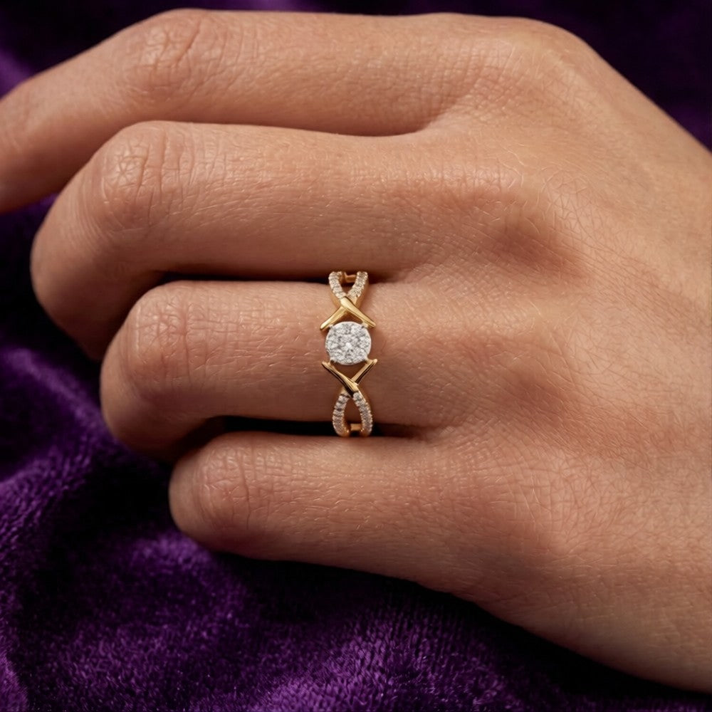 Close-up shot of a gold and diamond with cluster women's ring.