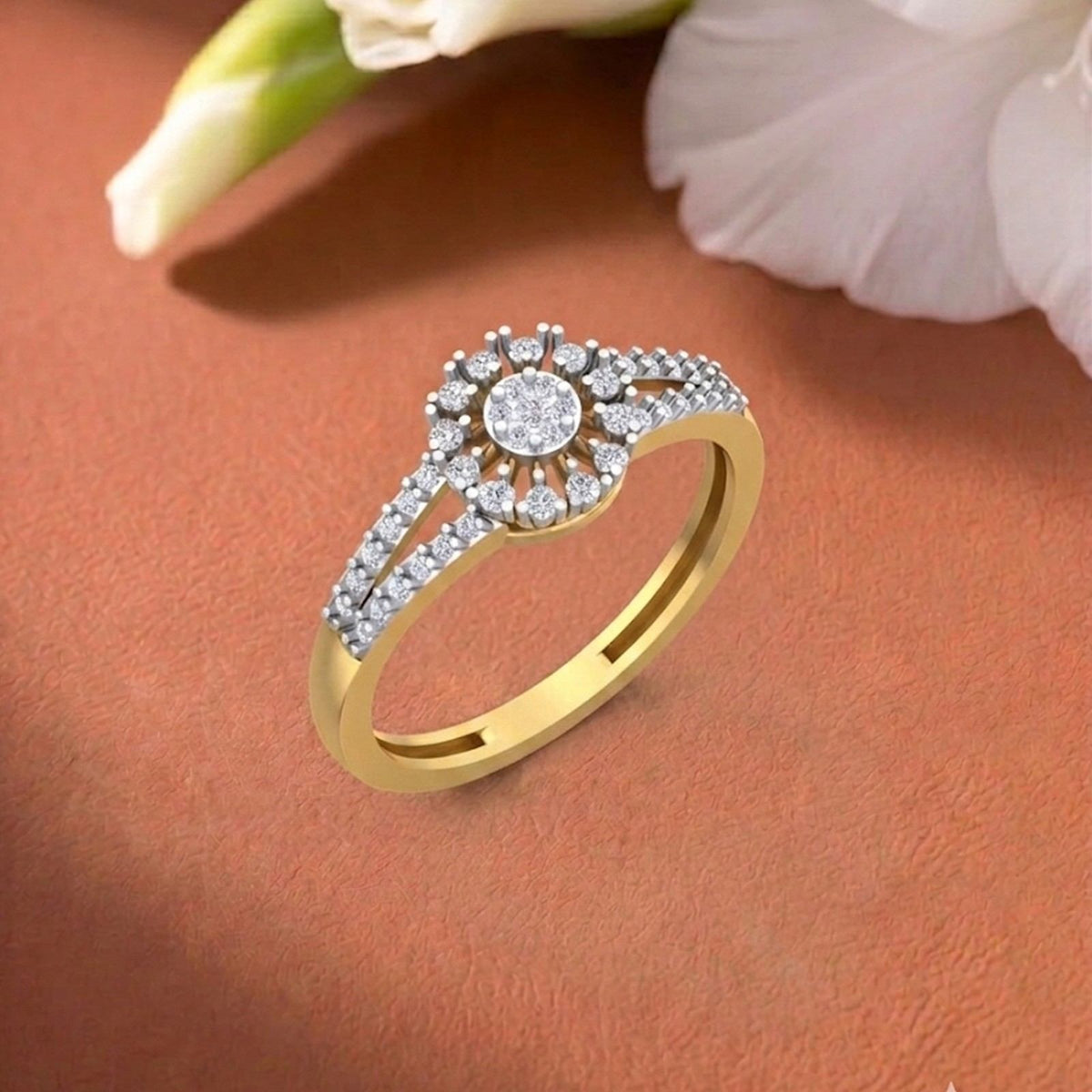 Gold ring with diamond accents on a orange surface.