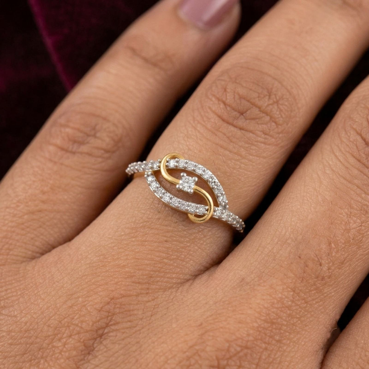 Close-up shot of gold and diamond women's ring.