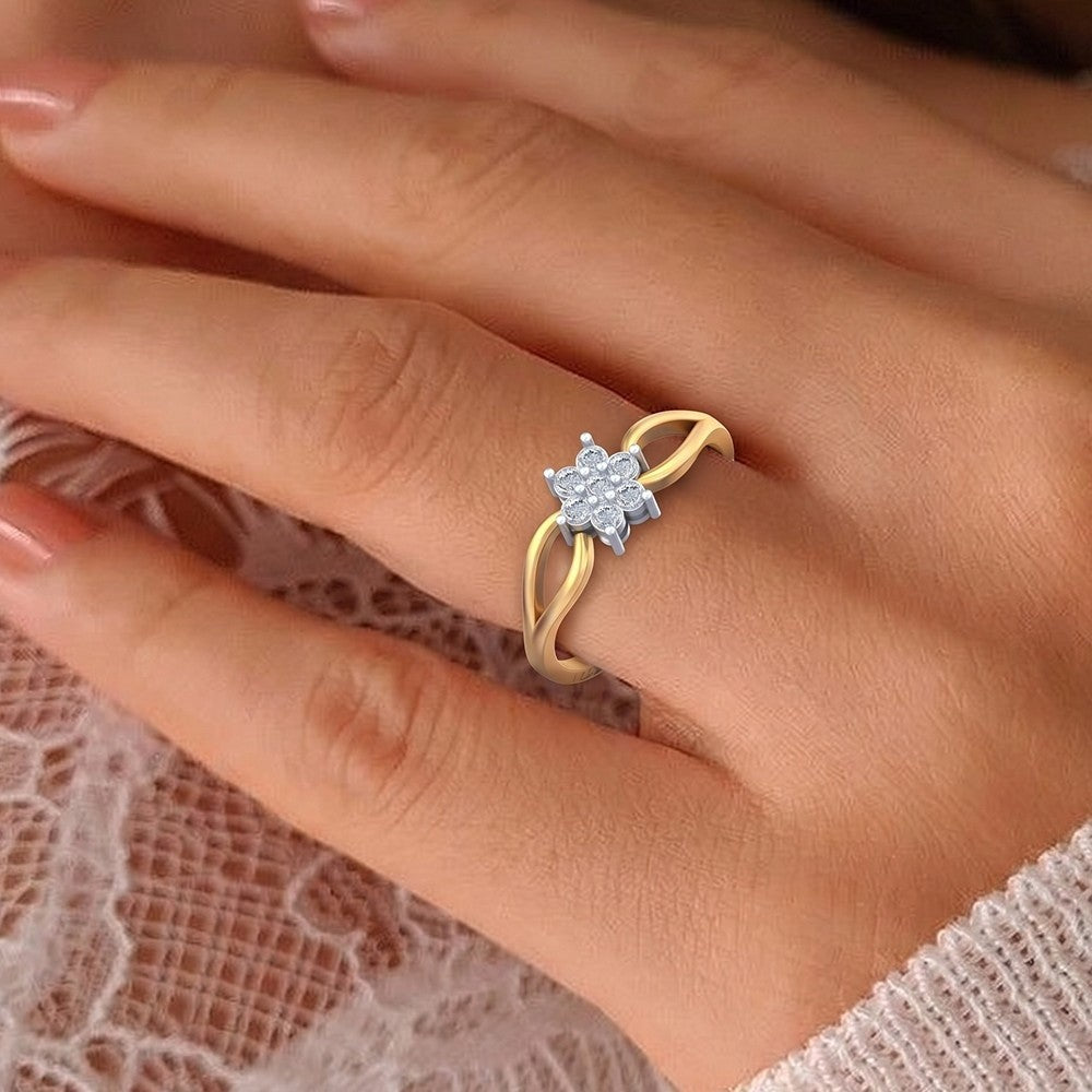 Close-up shot of a gold and diamond with floral cluster ring.
