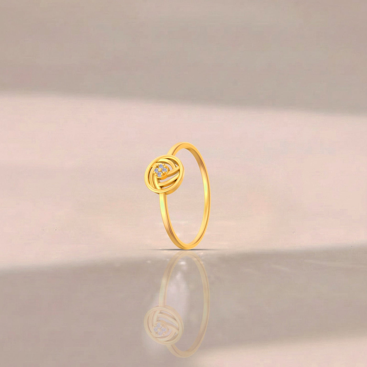 gold and diamond with round-shaped on a reflective surface.