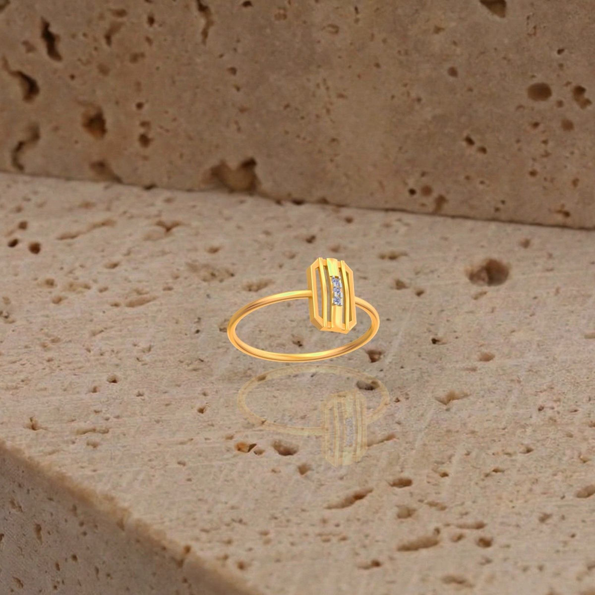Gold and diamond with rectangle-shaped on a reflective surface.
