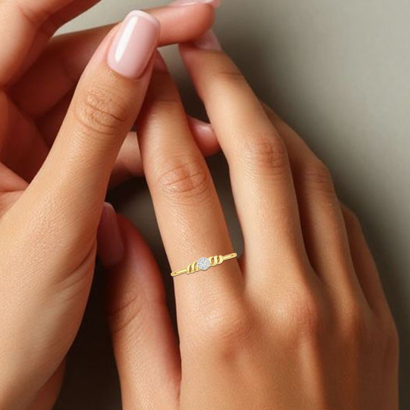 Close-up shot of a gold and diamond with cluster setting ring.