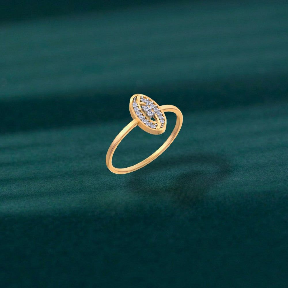 Gold and diamond with oval-shaped on a green surface.