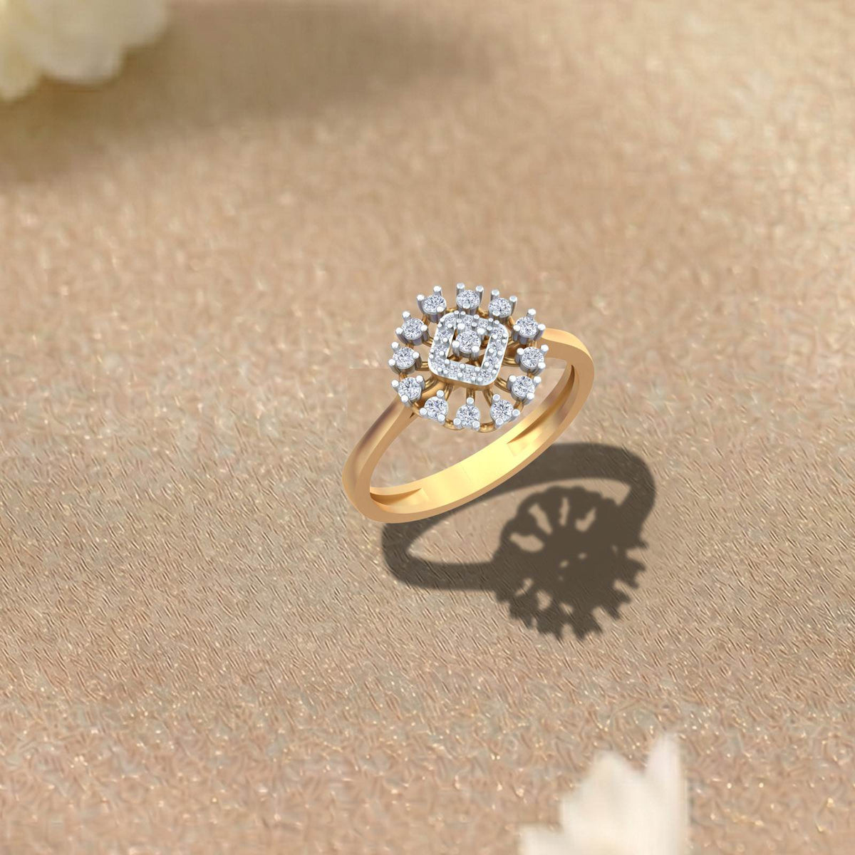 Gold and diamond with floral design on a beige surface.