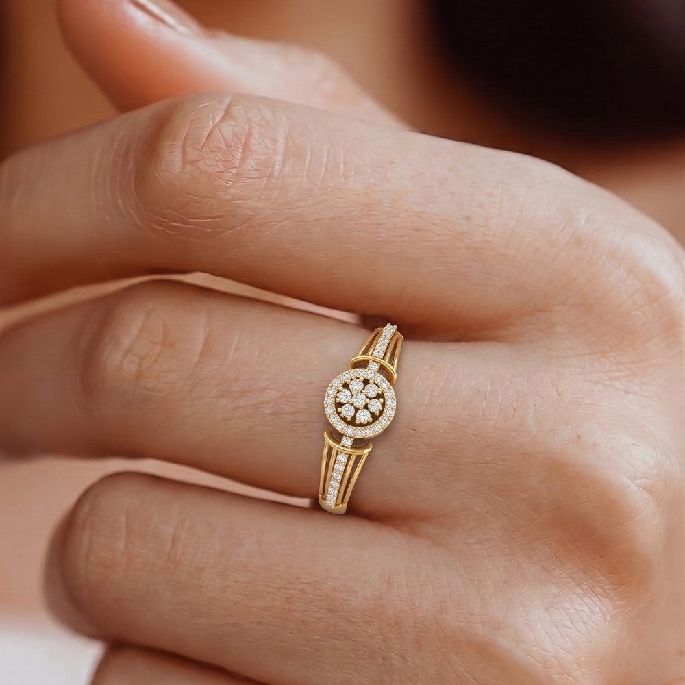 Close-up shot of a gold and diamond ring with cluster design.