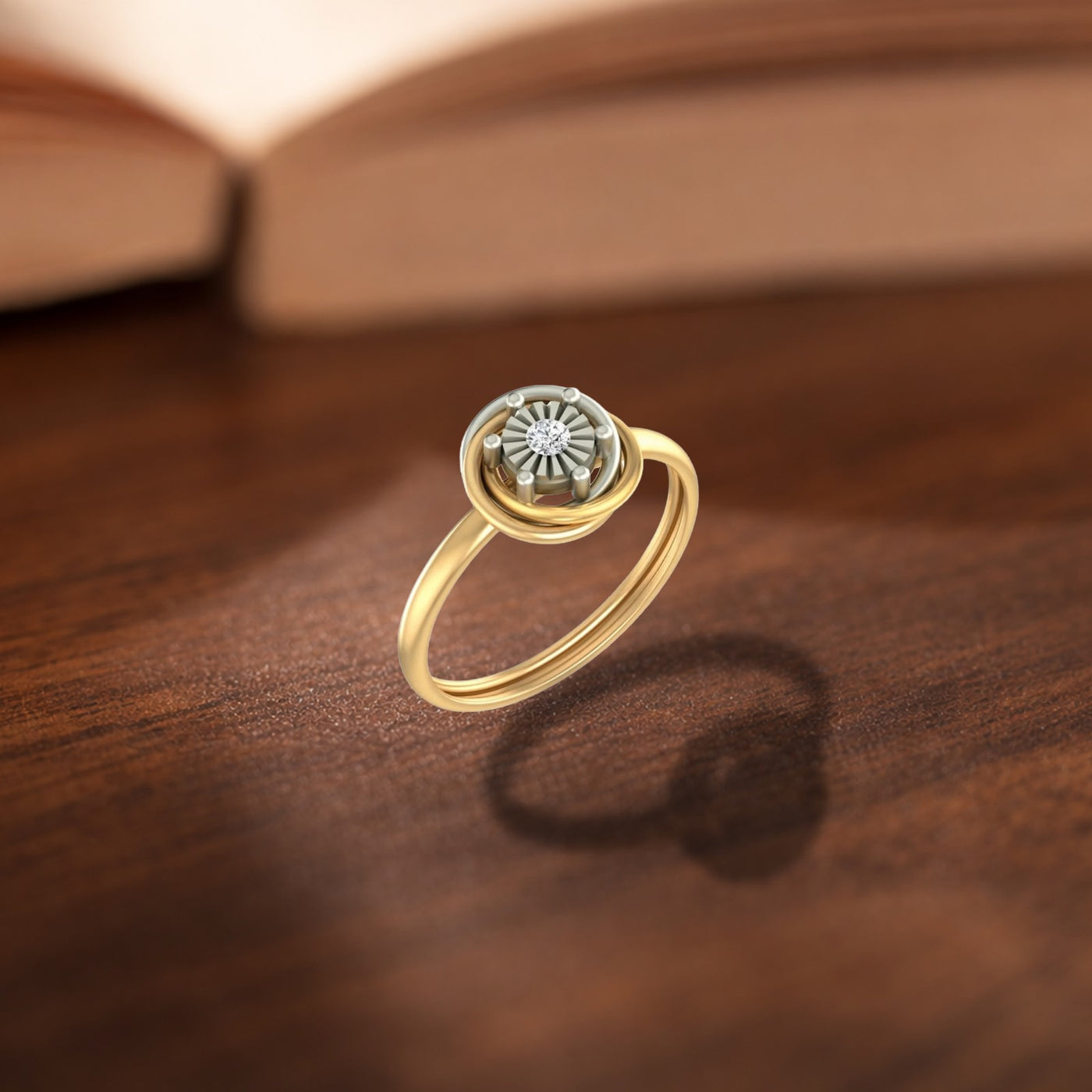 Gold and diamond women's ring on a wooden surface.