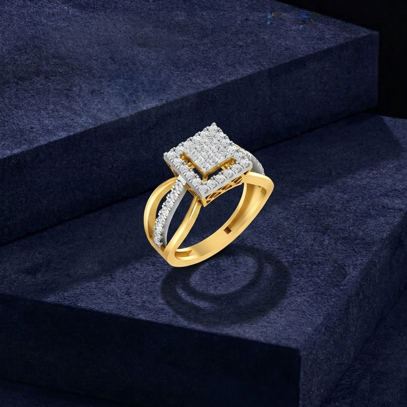 Gold ring with a square diamond on a dark blue textured background