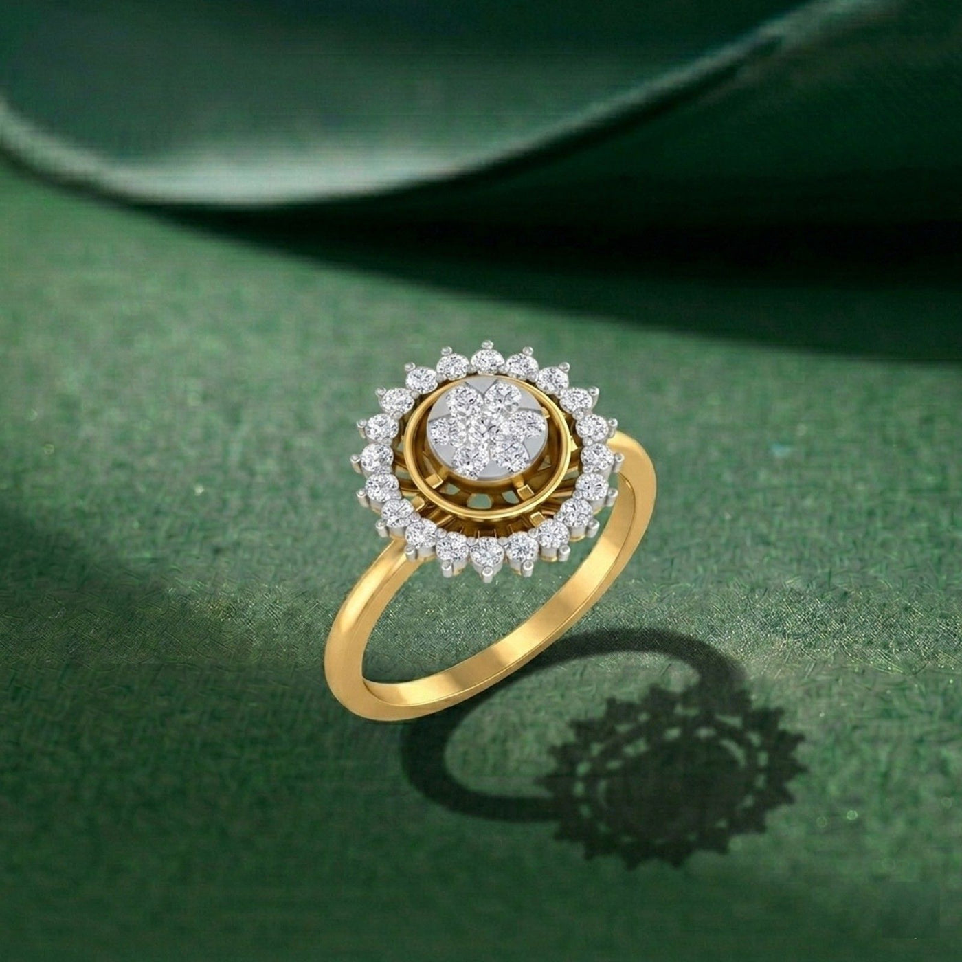 Gold ring with a diamond on a green background.