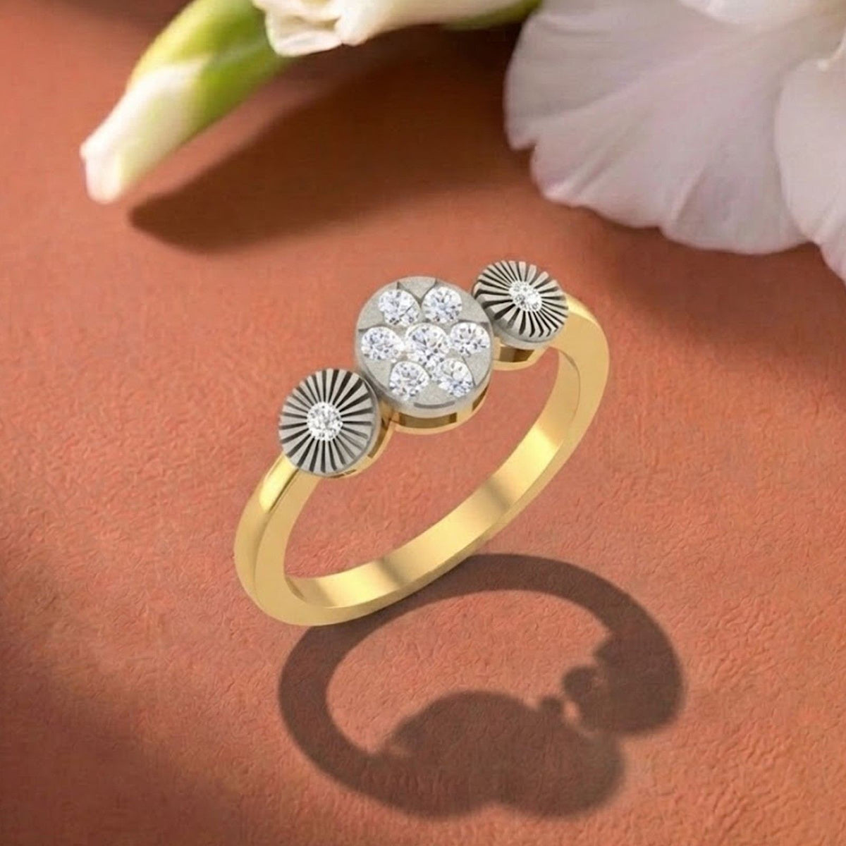 Gold and diamond with cluster design on a orange surface.