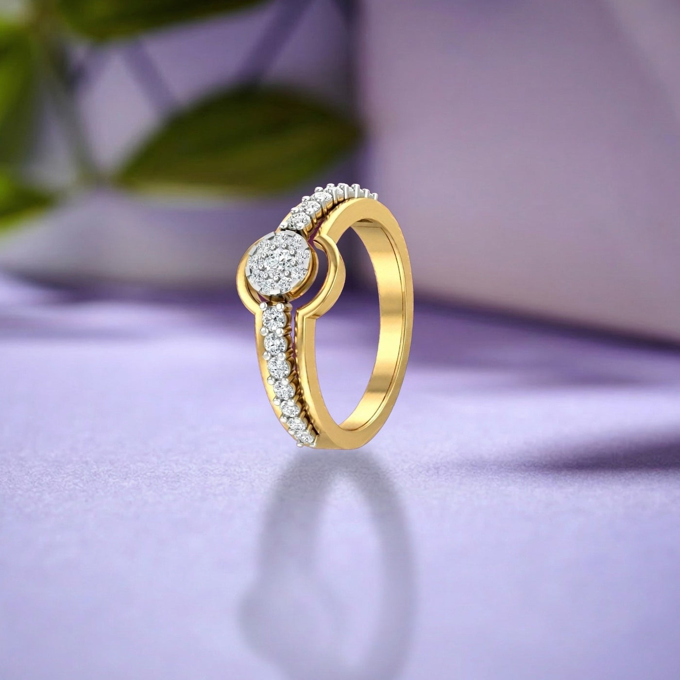 Gold ring with diamonds on a purple surface.
