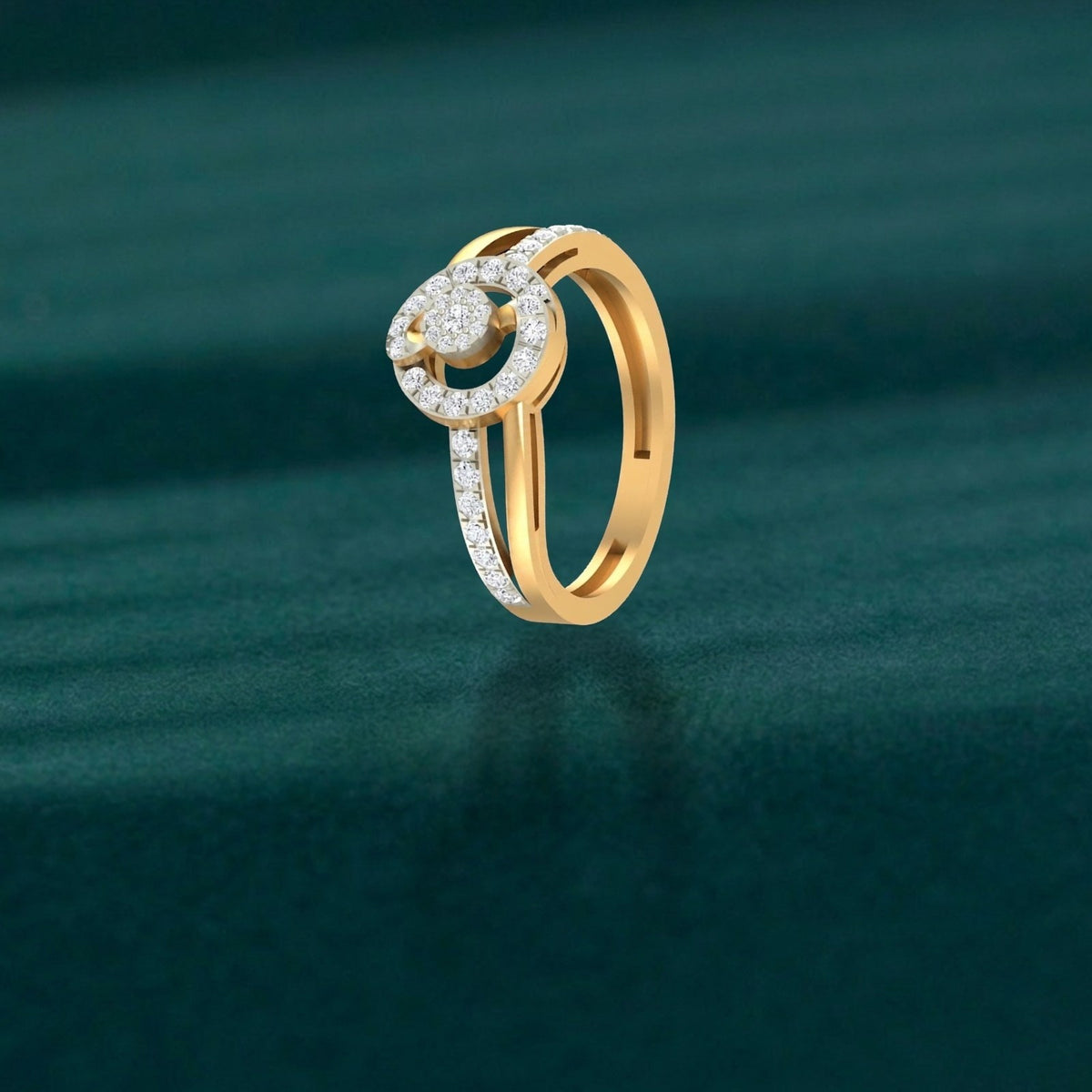 Gold ring with a halo design of clear stones, shown on a plain white background.