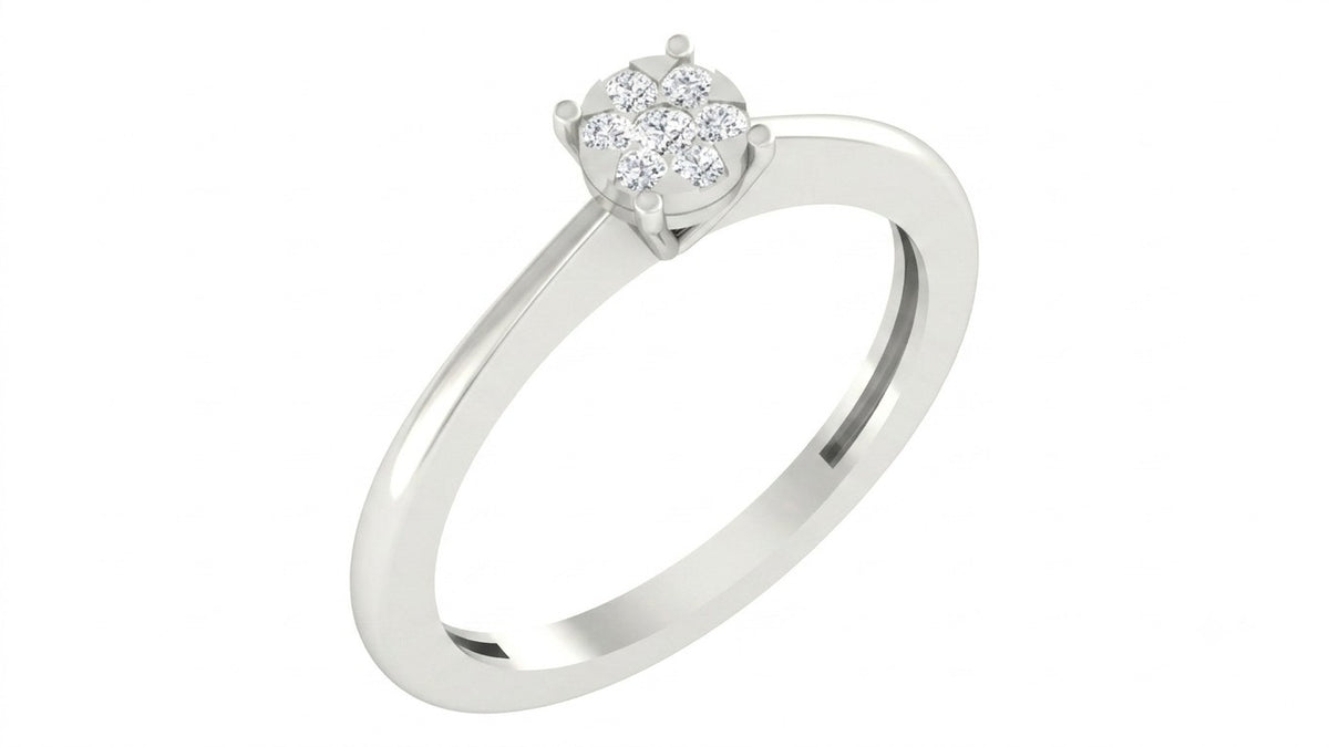 A white gold and diamond ring featuring a round diamond cluster setting on a plain white background.