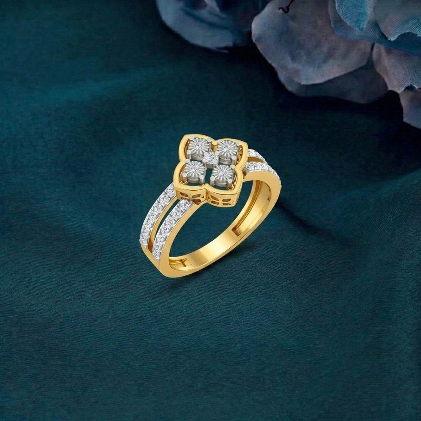 Gold ring with diamond accents on a dark green background.
