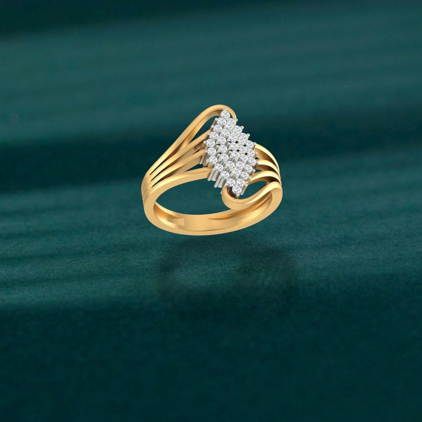 Gold ring with diamond accents on a green textured background.