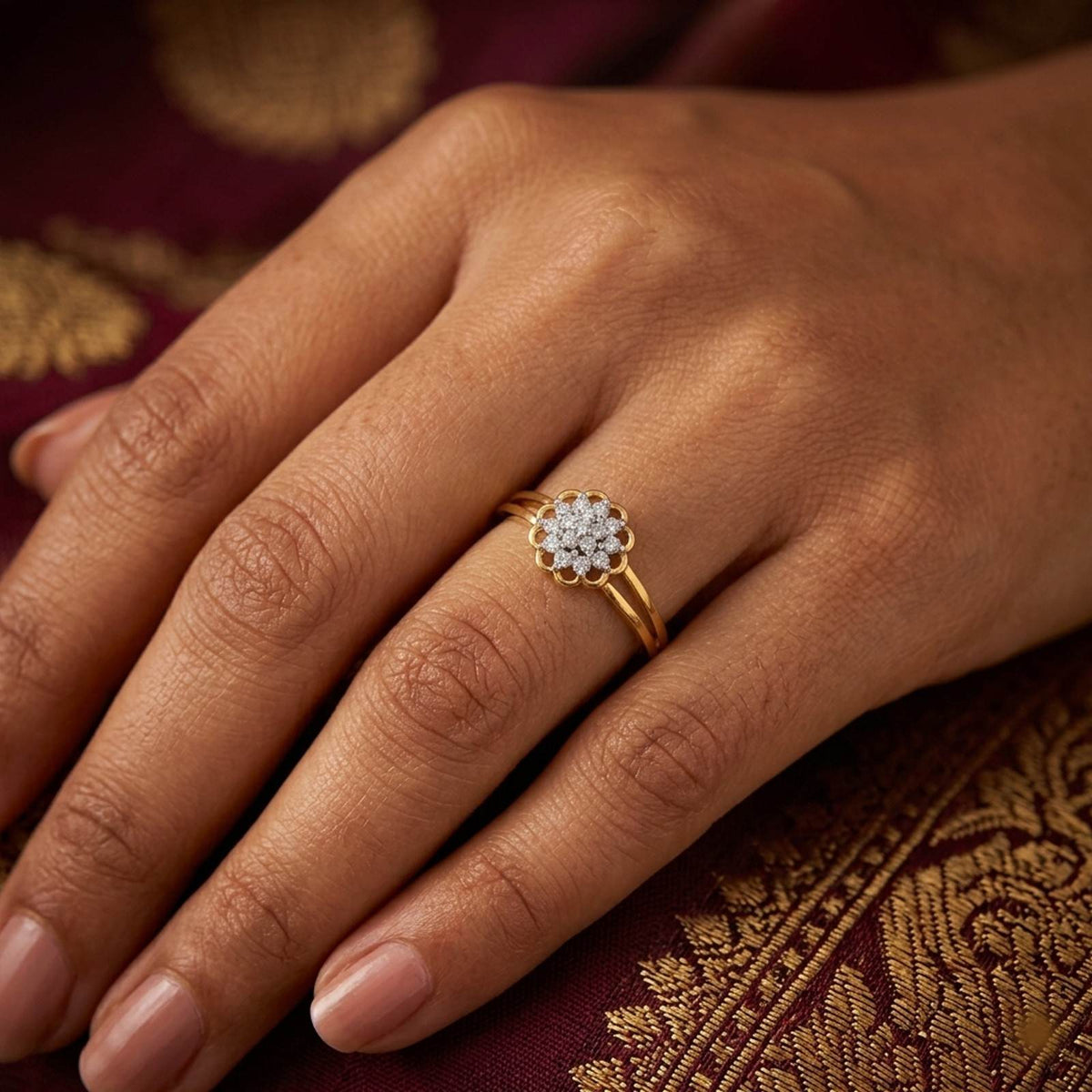 Gold ring with diamonds on a person's finger