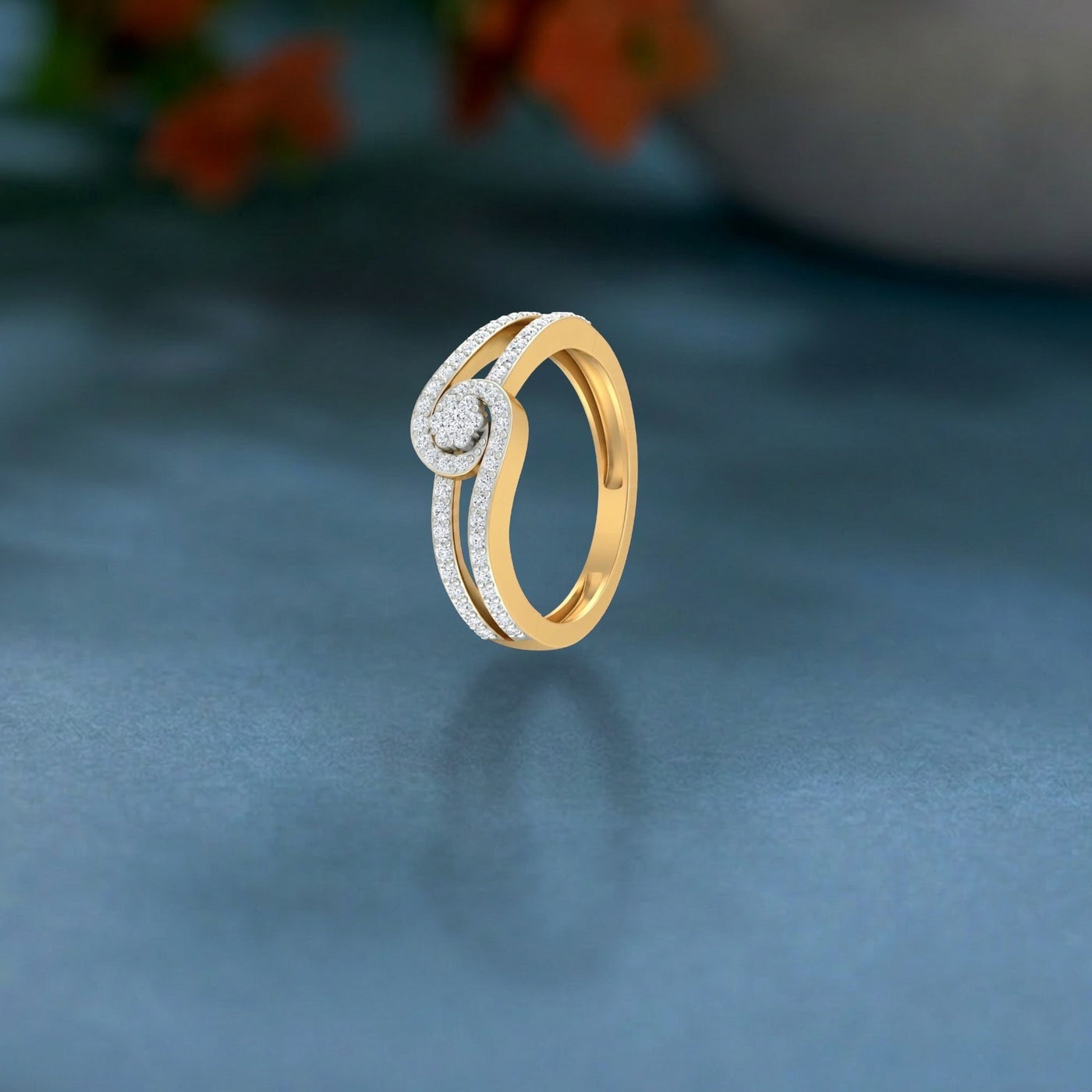 Gold ring with diamonds on a dark surface