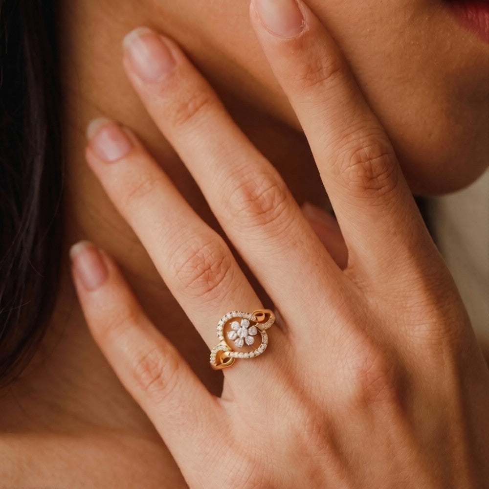 Close-up shots of a gold and diamond with floral design ring.
