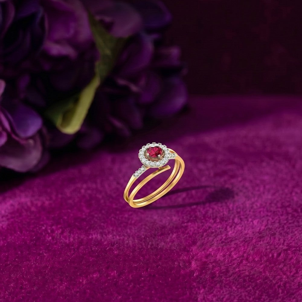 Gold and diamond with ruby gemstone on a magenta texture surface.