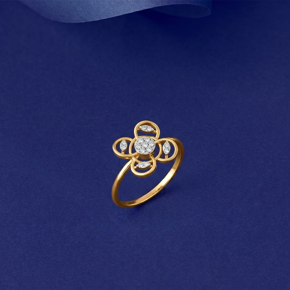 Gold and diamond with floral design on a blue background.