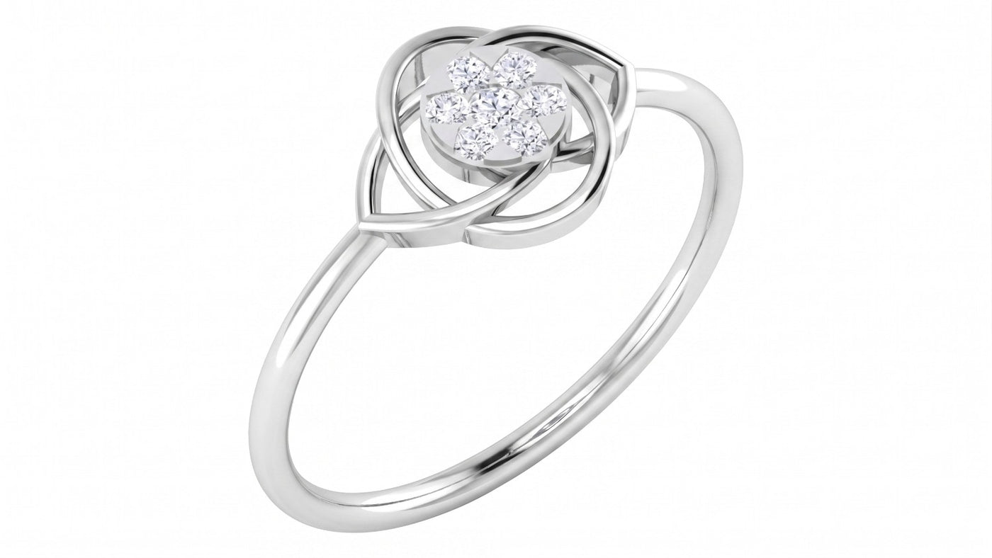A white gold ring featuring a floral-design pavé diamond setting on a white background.