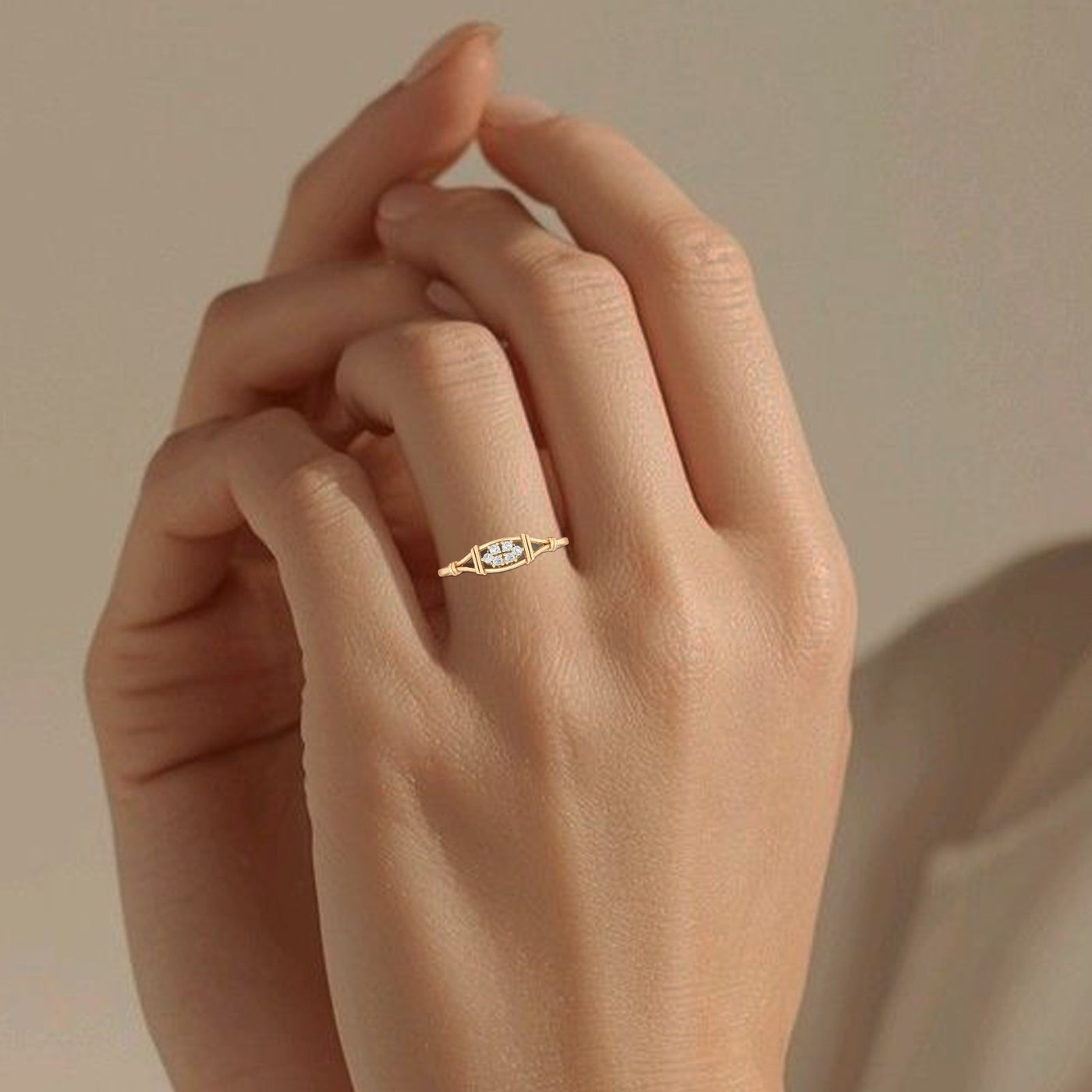 Close-up shot of a gold and diamond with cluster setting ring.