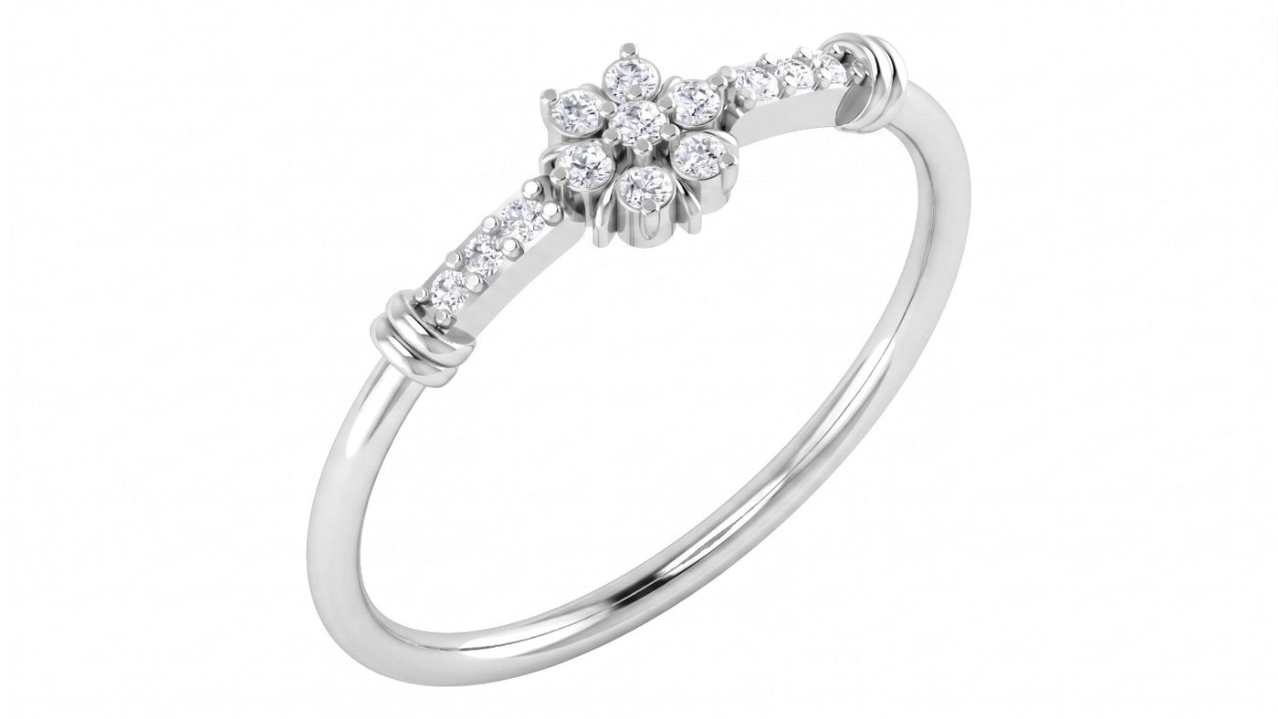 A white gold ring featuring a central flower motif set, shown on a plain white background.