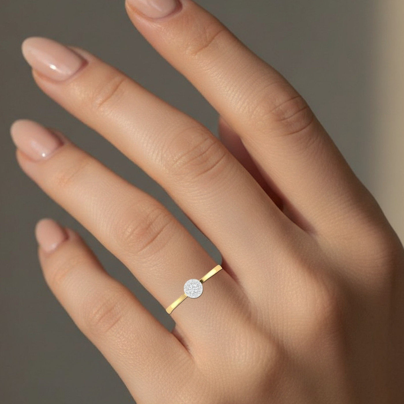 Close-up of a shot gold and diamond with cluster setting ring.