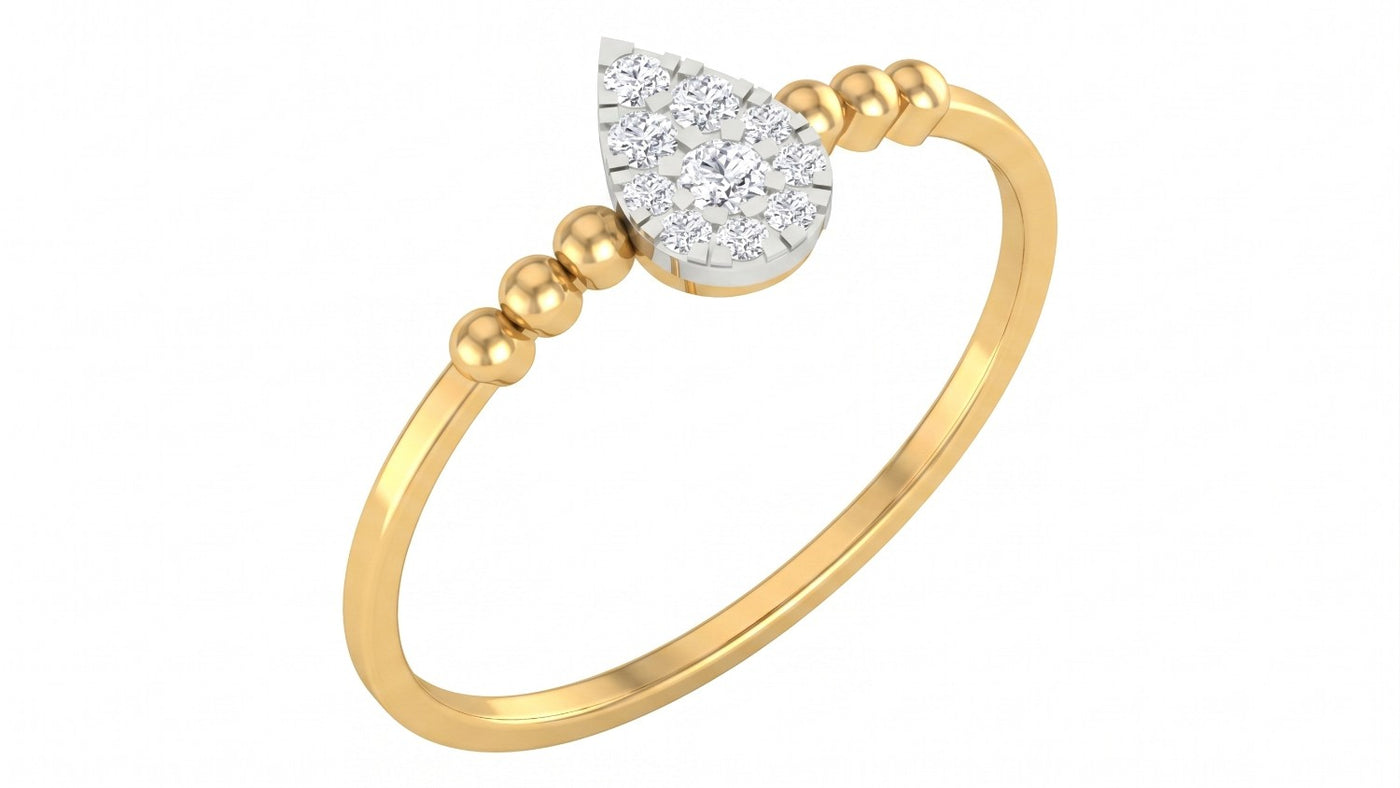 A yellow gold ring featuring a teardrop-shaped diamond cluster, set against a plain white background.