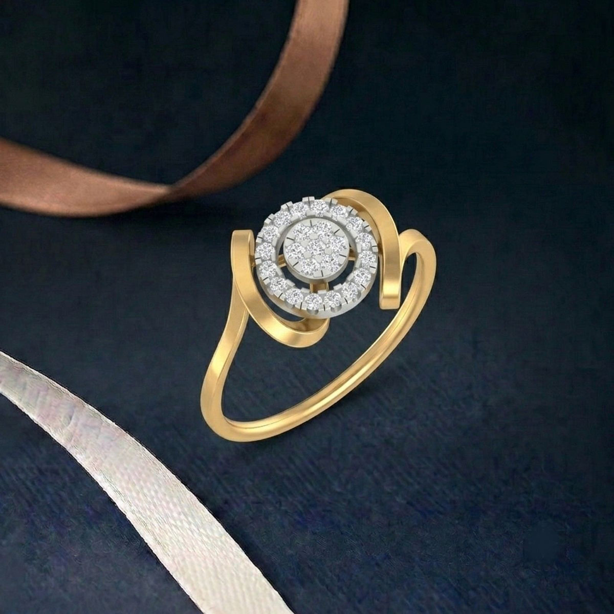 A gold ring with a round-cut cluster setting, displayed on a dark blue surface.