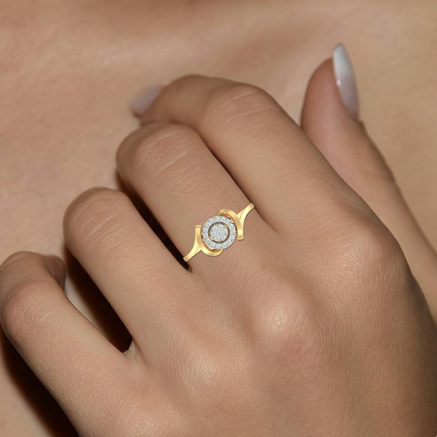 Gold and diamond with cluster setting on a person's finger.
