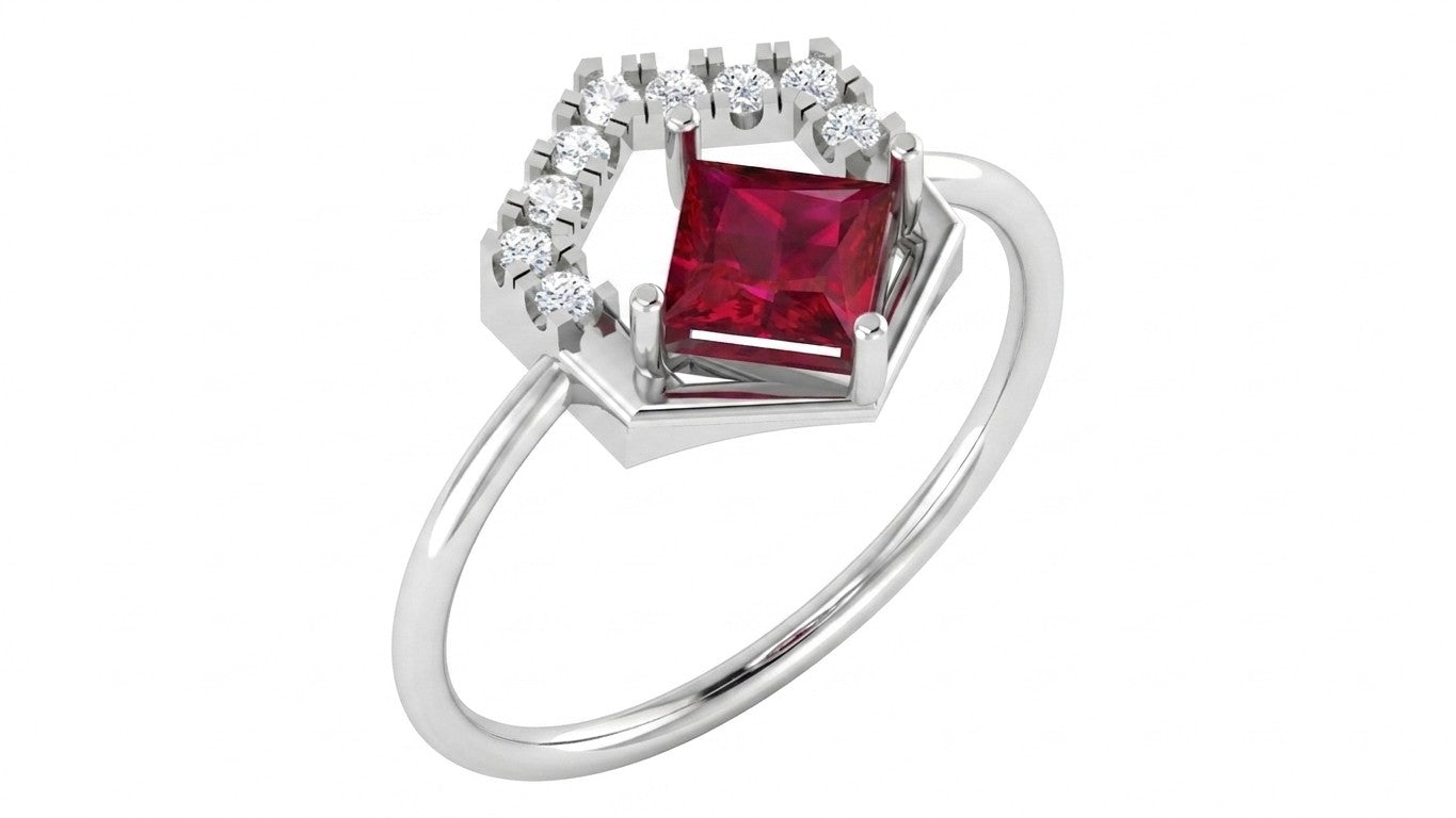A white gold ring featuring a central square-cut red gemstone surrounded by a halo of small clear stones, shown on a plain white background.