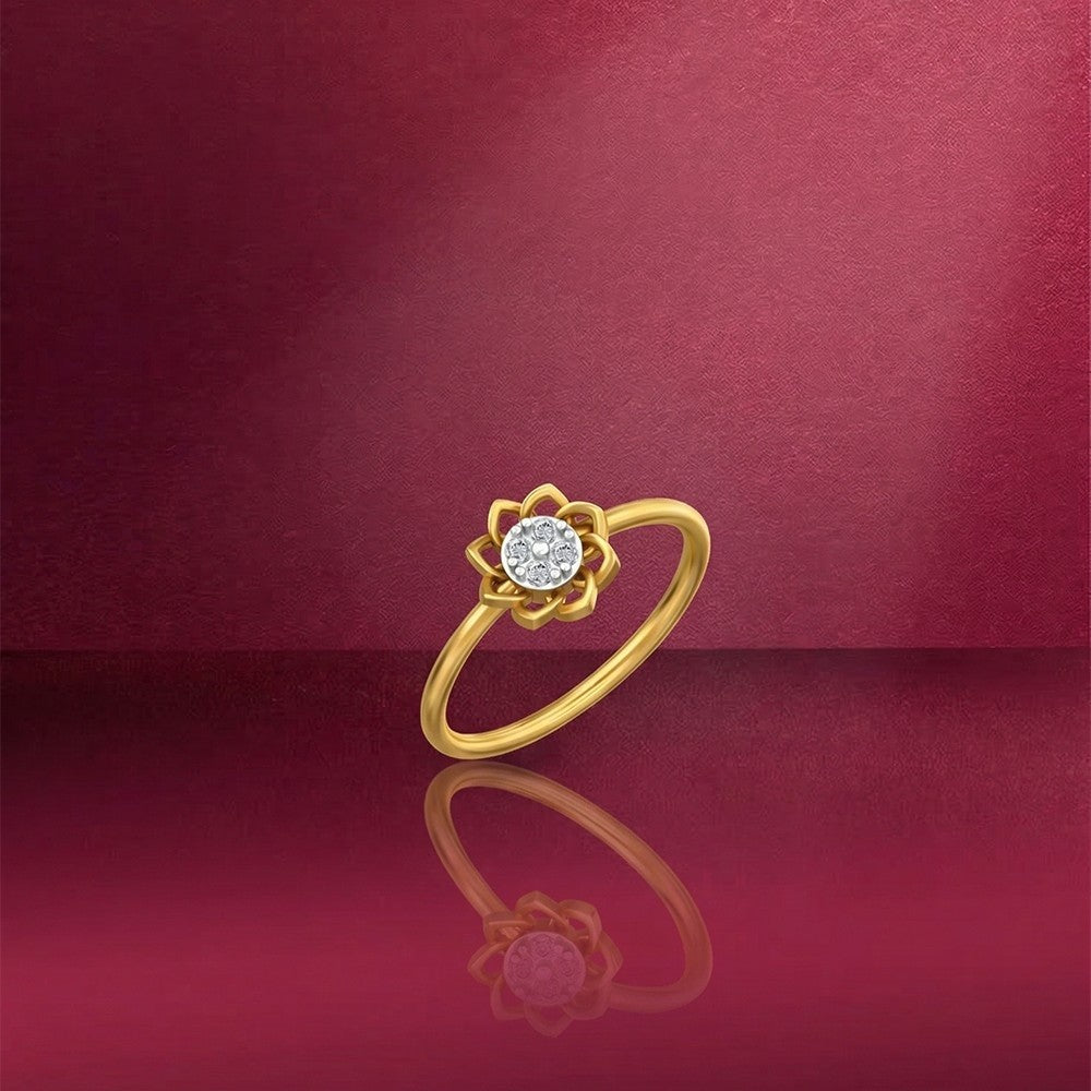Gold and diamond with floral design on a red reflective surface.