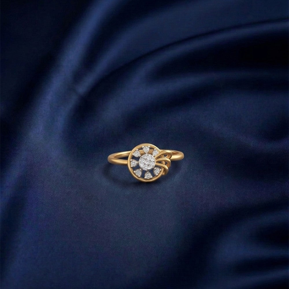 Gold ring with diamonds on a dark blue fabric background