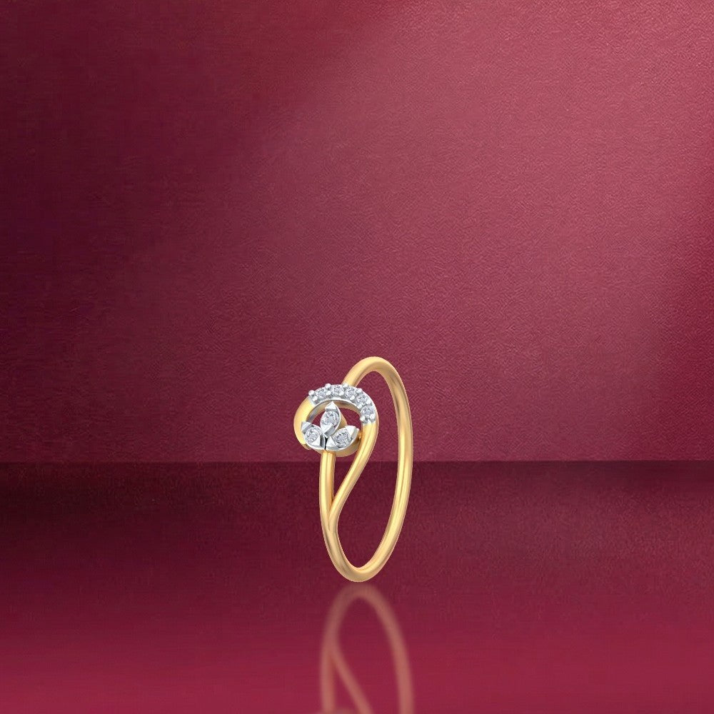 Gold and diamond with women's ring on a red reflective surface.