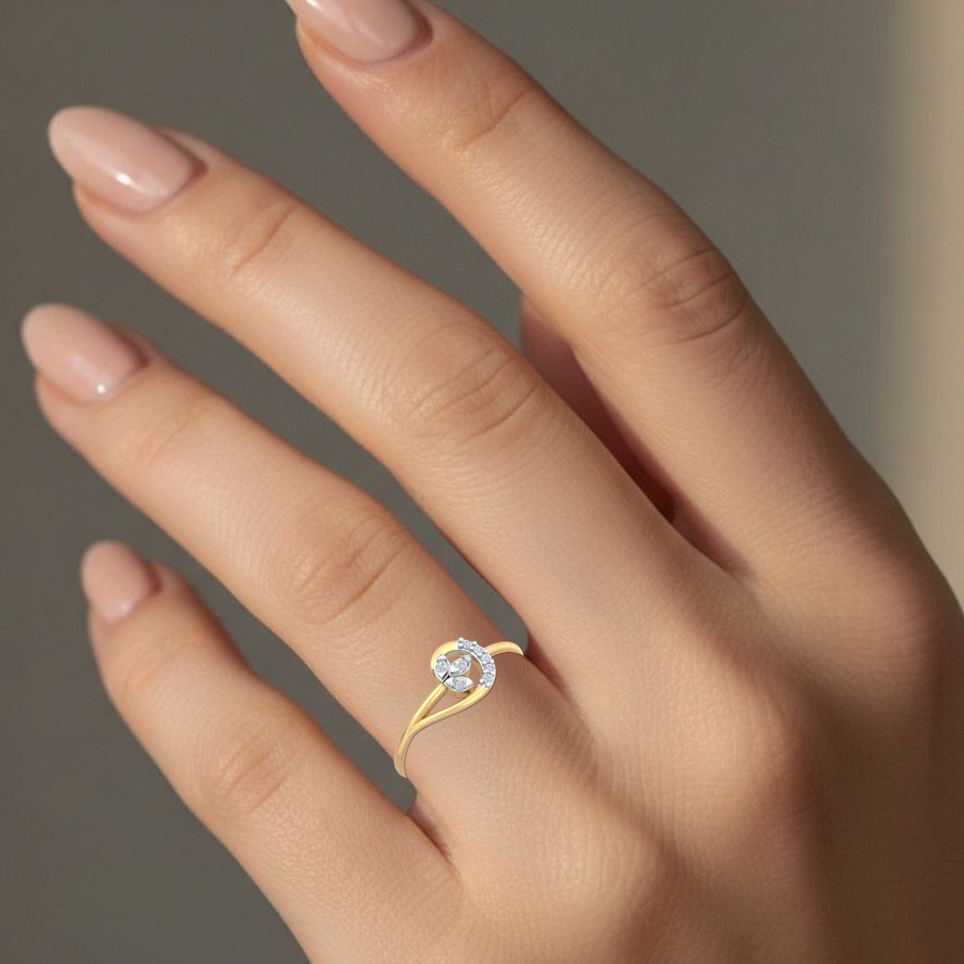 Close-up shot of a gold and diamond with women's ring.