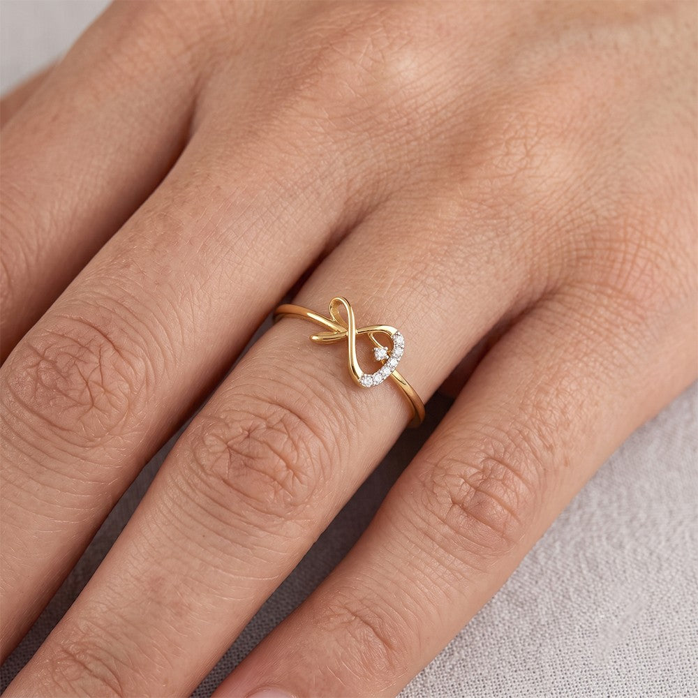 Close-up shot of a gold and diamond women's ring.
