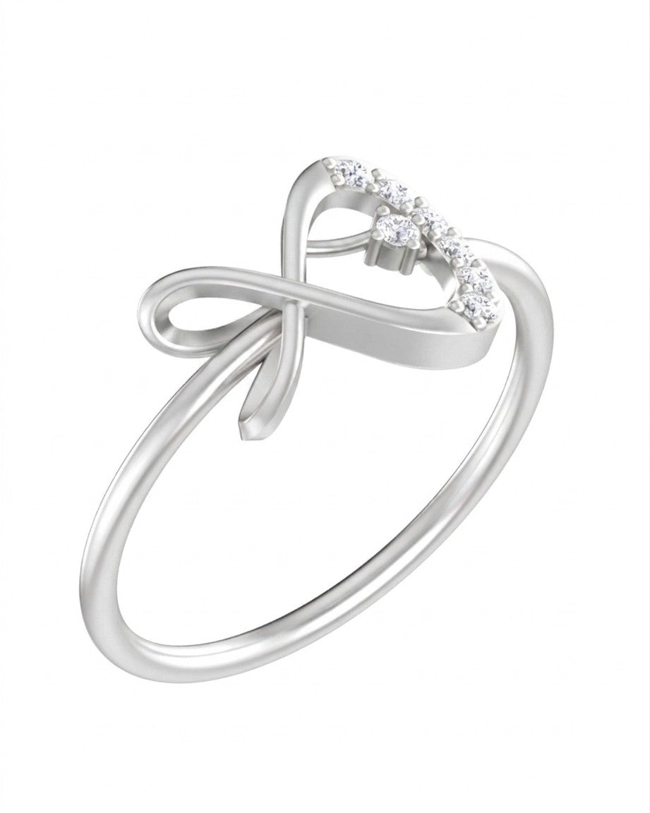 White gold and diamond women's ring on a white background.