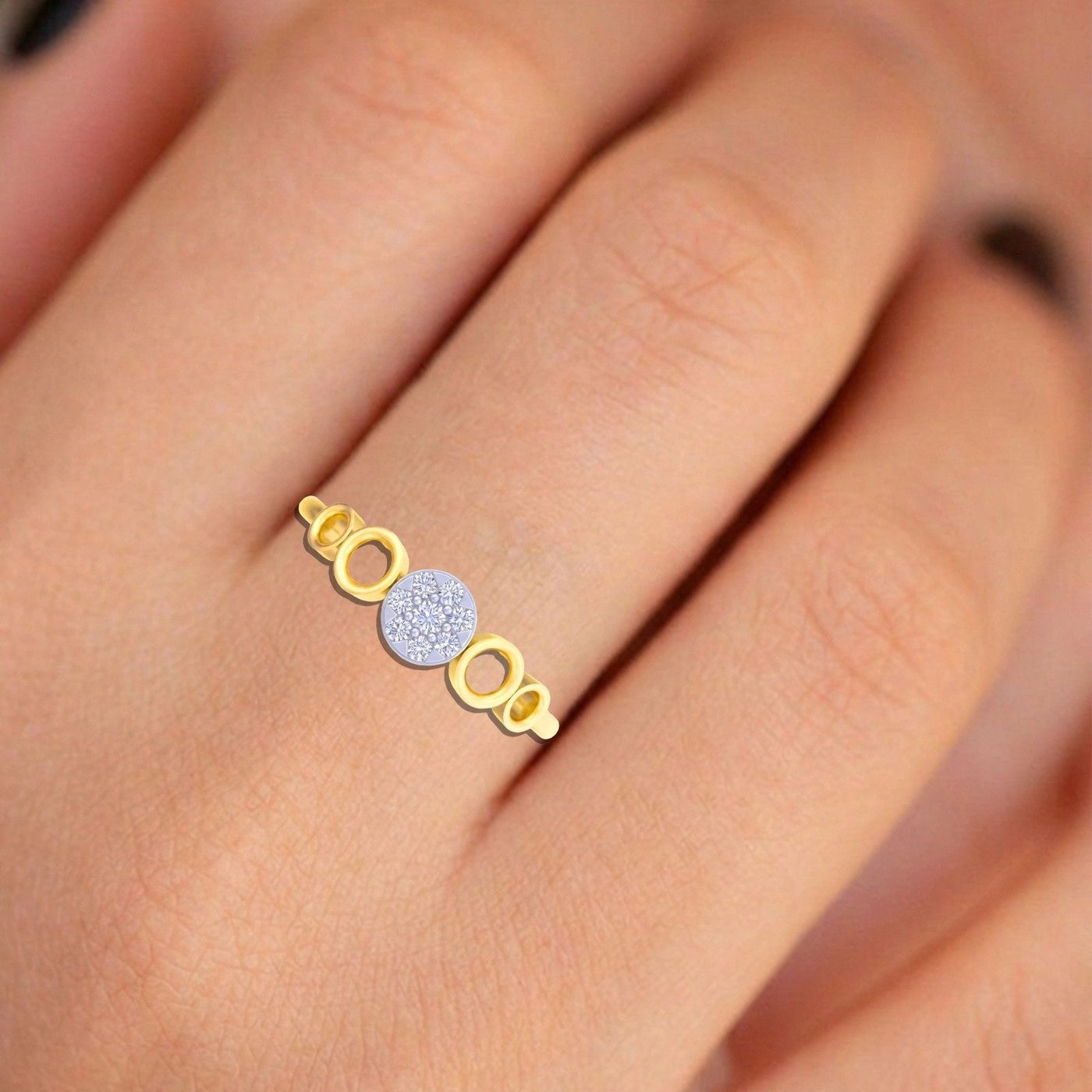 Close-up shot of a gold and diamond with round-shaped cluster setting ring.
