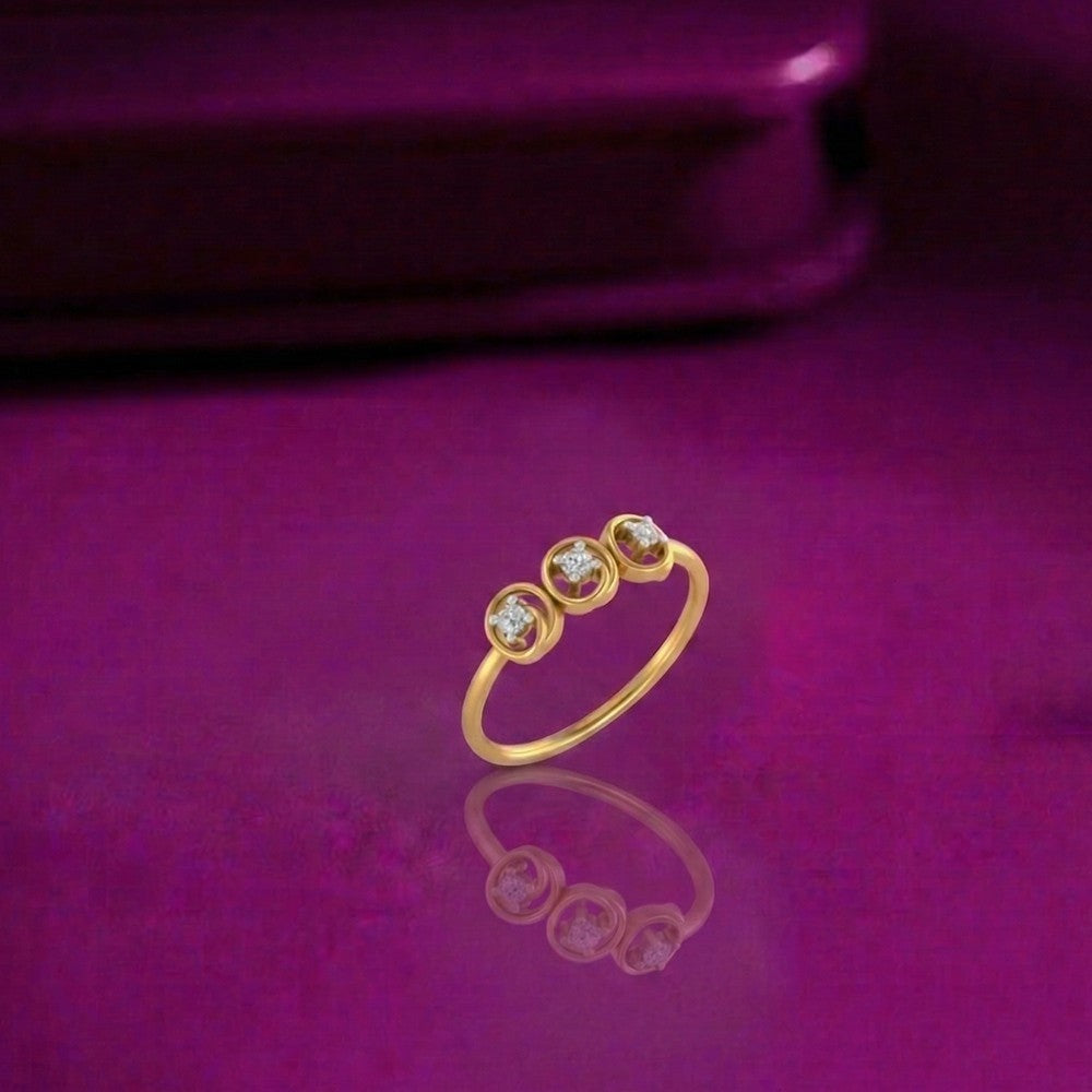 Gold and diamond with circular on a reflective surface.